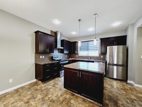 Building Photo - 1203 McConachie Blvd NW