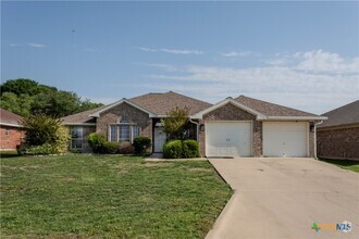 Building Photo - 511 Cowhand Dr