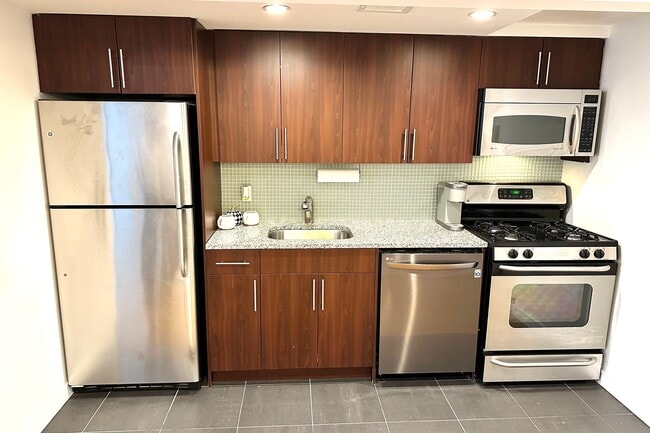 Photo - 555 W 23rd St Apartment