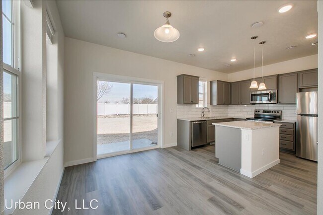 Building Photo - 3 br, 2.5 bath House - 5843 S Carlburg Lane