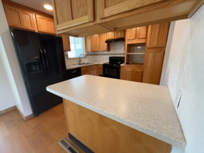 Building Photo - Welcome to this beautiful tri-level home!
