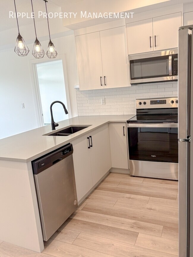 Photo du bâtiment - INCREDIBLE 2 BEDS/ 2 BATHS CONDO | SPRINGBANK HILL LIVING