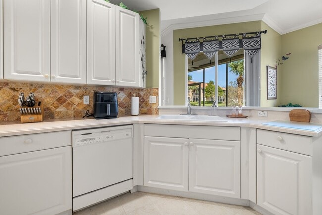 Building Photo - Experience Bell Tower Park. GATED ground floor 2 Bed 2 Bath Den 1 Car Garage Condo.