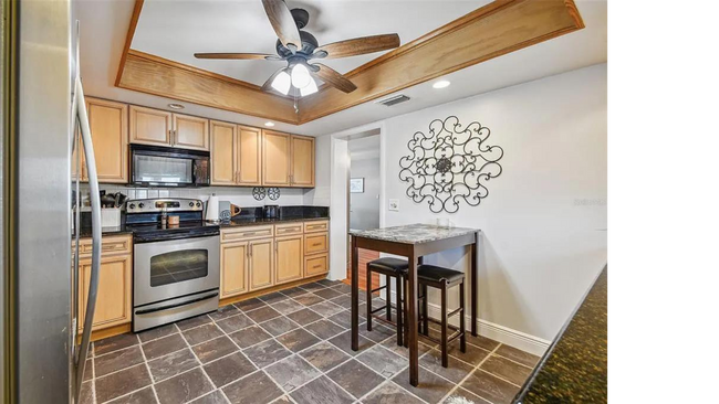 Building Photo - Beautiful 2-Bedroom Condo in a 55+ Communi...