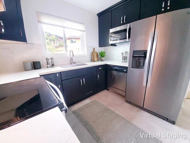 Foto del edificio - Lovely top floor condo unit; 2 bed/ 2 bath