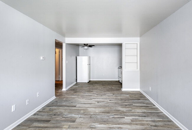 Living Room/ Kitchen - Riverview Place Apartments