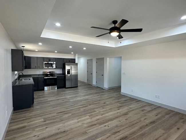 Building Photo - NEW CONSTRUCTION 5 Bed 3 Bath w/ Walk Out ...