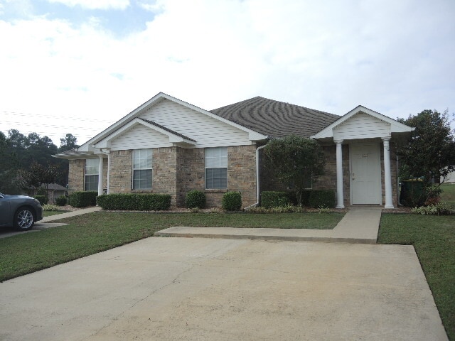 Each side has their own 2 space designated parking with sidewalks and a covered front door. - 5115 Galloping Way