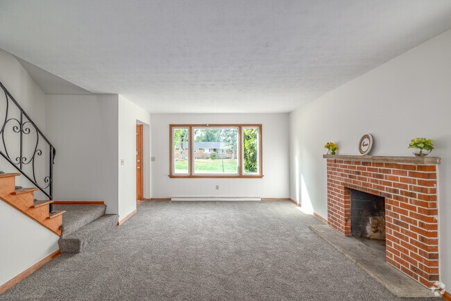 3BR, 1.5BA - 1,650SF - Living Room - Glenwood Townhomes