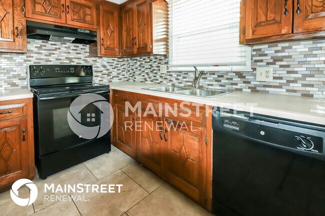 Foto del edificio - 12206 E 57th St