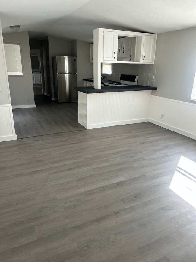 Living Room Into Kitchen - 467 Vanzant Rd