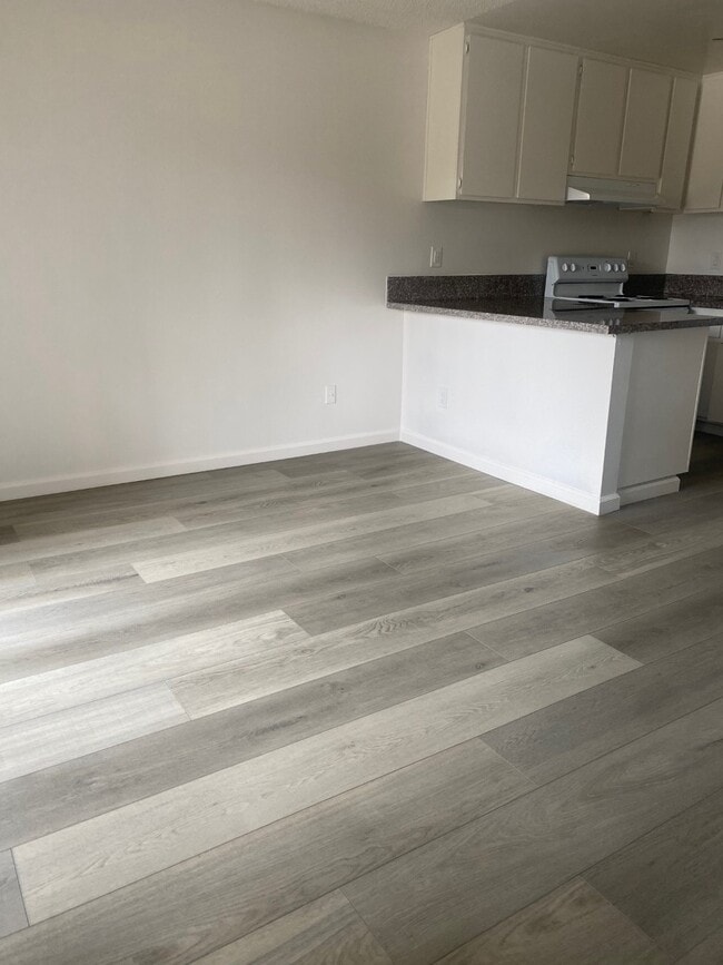 Spacious Studio Living/Dining Area - Ming Garden Apartments