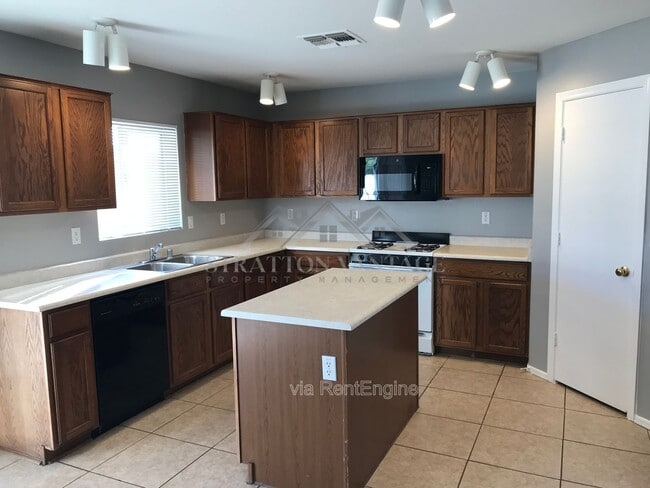 Building Photo - 12525 W Rosewood Ln