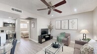 Located at 960 W Southern Ave in Mesa, AZ, this efficiently designed one-bedroom, one-bathroom residence offers a thoughtfully organized single-floor layout. The living room features light wood-look flooring, neutral gray walls, a textured ceiling, and a ceiling fan, creating a comfortable and inviting atmosphere. A window with blinds allows natural light to fill the space, while an open sightline connects the living area to the kitchen, which is equipped with white cabinetry, stainless steel appliances, and light countertops. The bedroom is a cozy retreat with its own ceiling fan, a window that brings in natural light, and the same wood-look flooring found throughout. A door from the bedroom provides convenient access to the closet and bathroom. The bathroom is fitted with a full tub and shower combination, accented by a soft sage-green curtain and clean white surround. Throughout the unit, the consistent use of light, neutral tones and wood-look flooring creates a cohesive and calming aesthetic. This well-maintained Mesa residence offers a practical and comfortable living space ideal for those seeking a streamlined, easy-to-maintain home.