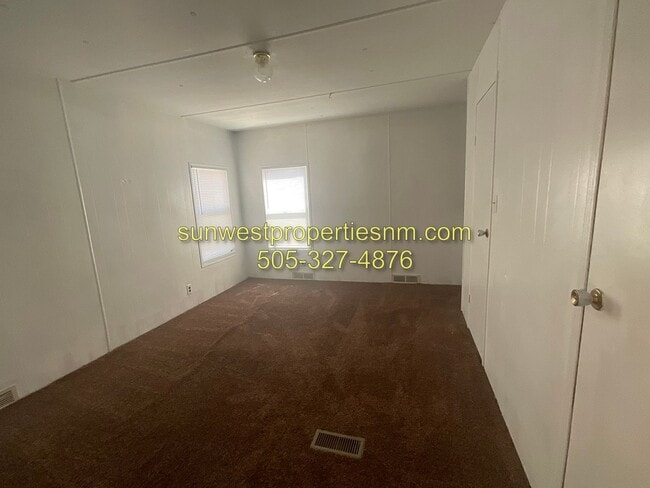 Building Photo - 2 Bedroom, 2 Bath. Mobile Home with W/D Hook-ups and Fenced Back Yard
