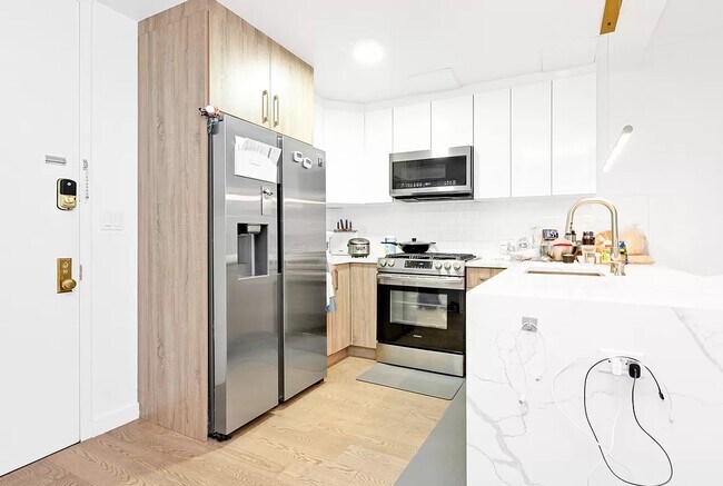 Foto del edificio - Modern 1BR – Limited Availability