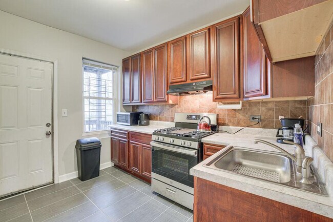 Foto del edificio - 7440 S Ingleside Ave