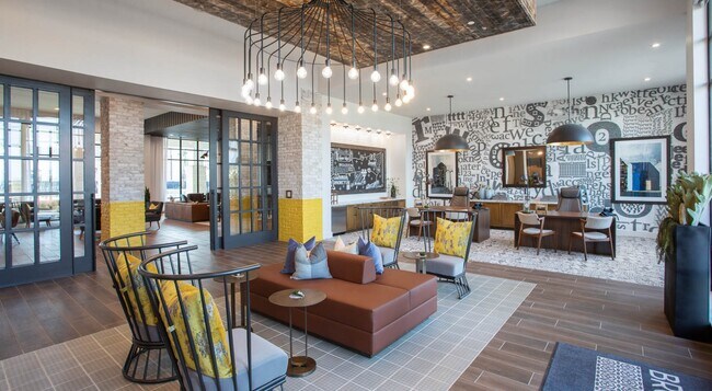 Building Photo - Downtown Dwellings: Where Convenience Meet...