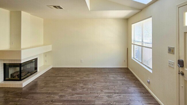 Building Photo - Updated condo with 2 car garage