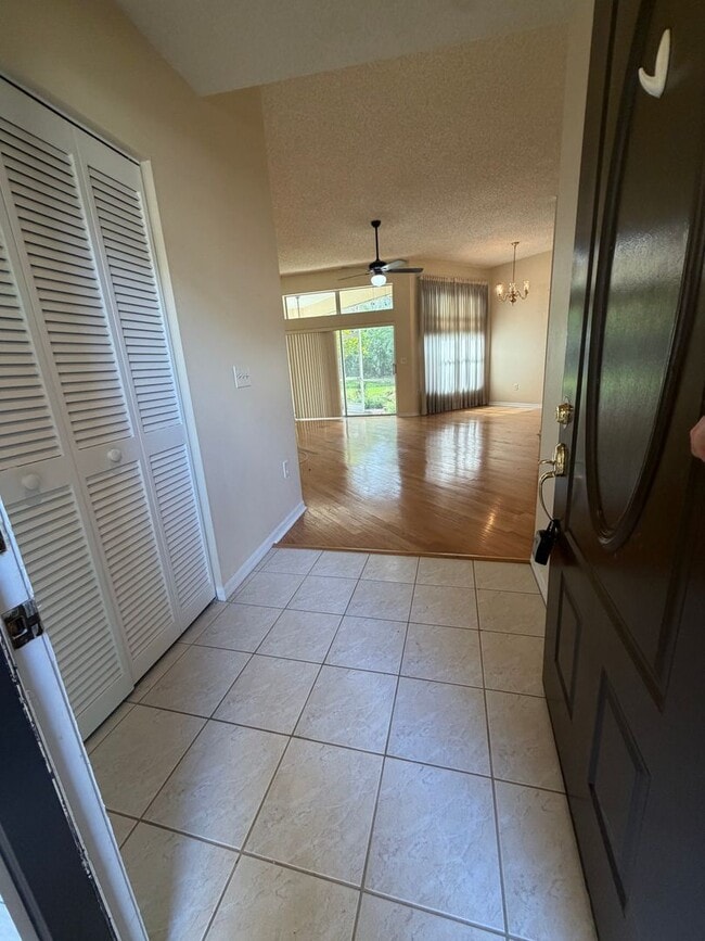 Building Photo - First floor condo in gated East Lake Woodlands of Oldsmar with one car garage