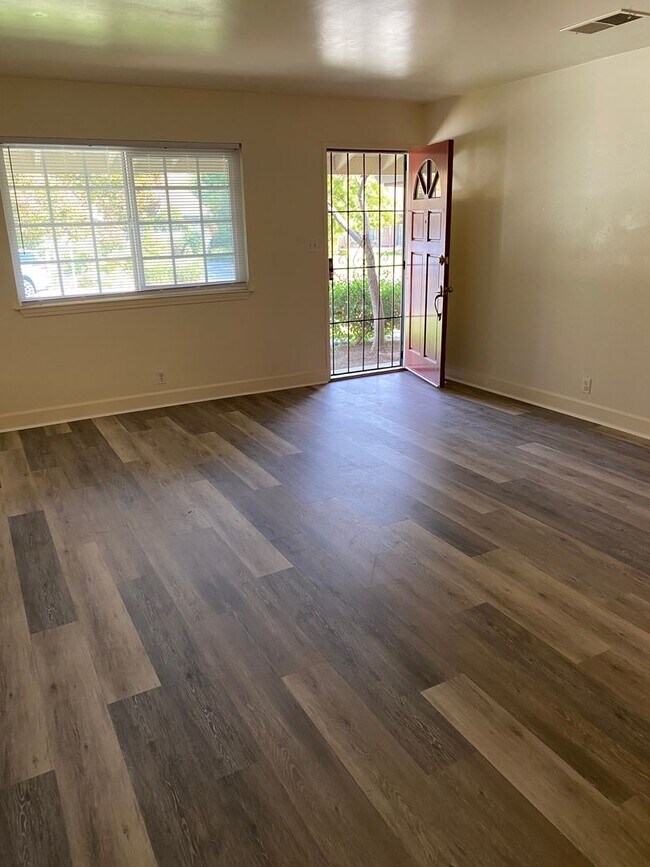 Building Photo - Located near downtown! Updated 3bed/2bath home with large family room/Rec room and side RV parking