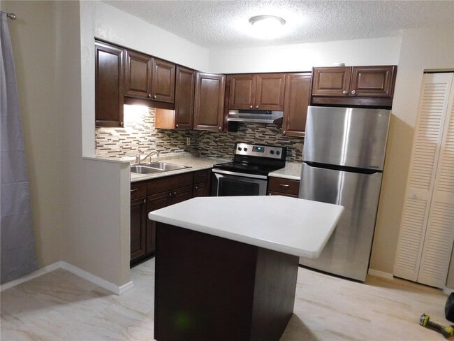 Building Photo - "Charming 1-Bedroom with Granite Touches in Port Charlotte!"