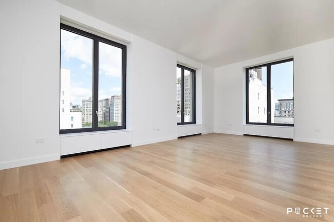 Building Photo - 21 E 12th Street Unit 11A