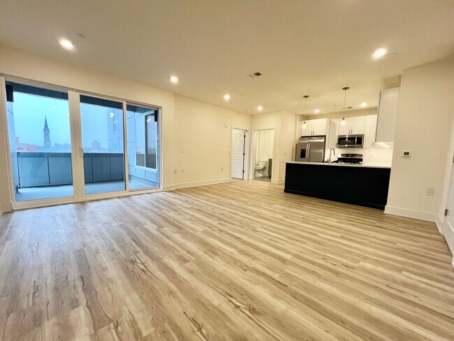 Foto del edificio - Modern 2-Bed, 2-Bath Apartment with Balcon...