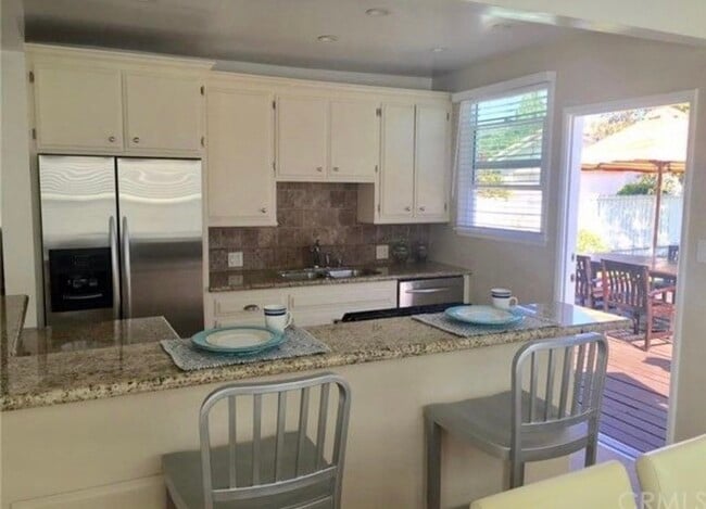 Bright kitchen with island. - 6509 W 83rd St