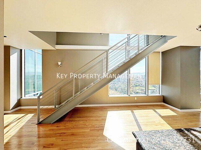 Building Photo - High Rise Metropolis 2 bedroom Condo with ...