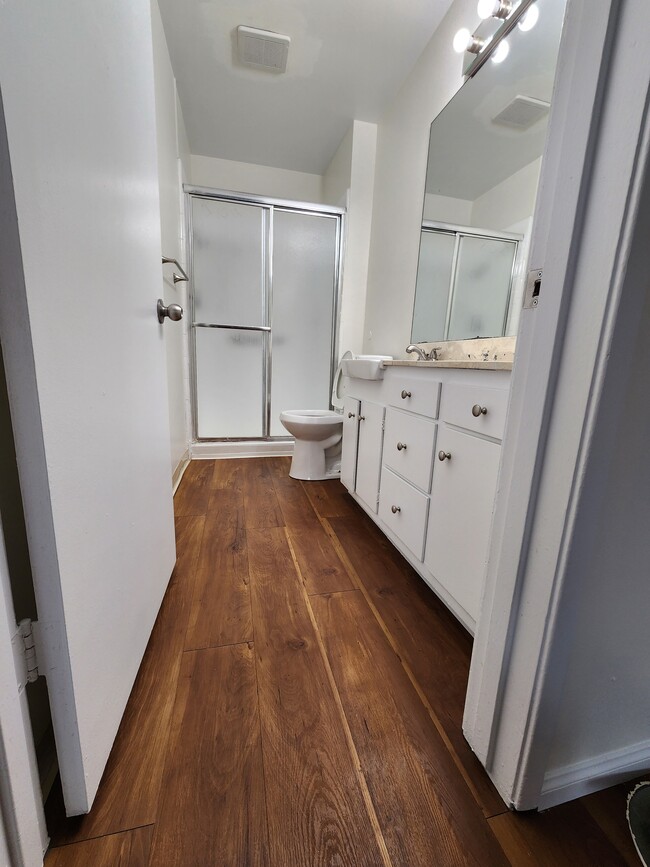 Master Bathroom with standing Shower - Monroe Manor Apartments