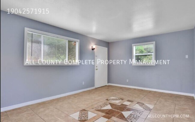Building Photo - 6767 Tinkerbell Ln