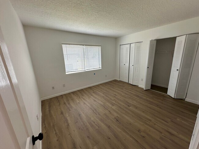 Building Photo - Minutes from UCF & Full Sail – Updated 2 Bedroom Townhome