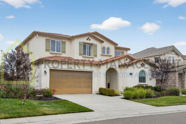 Building Photo - Spacious Elegance Awaits: 4-Bedroom Home with Hardwood Floors in Elk Grove!