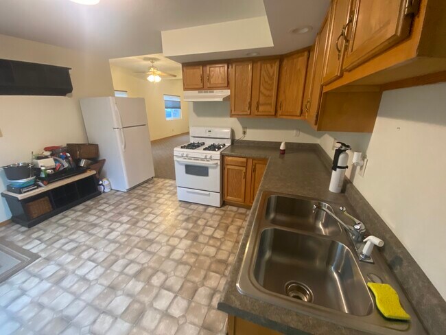 Kitchen toward living - 100 4th Ave NW