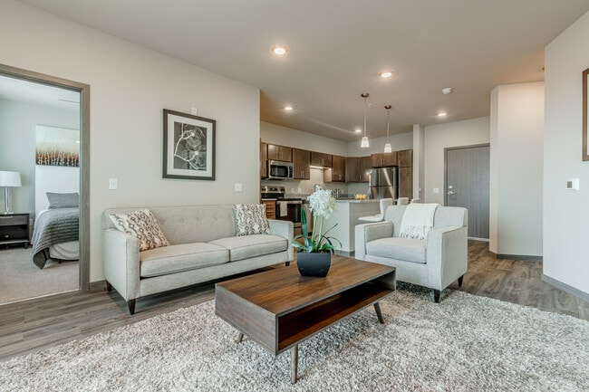 2 Bedroom Living Room - Covered Bridge 1 Residences, LLC