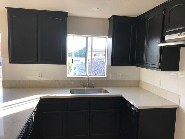 New Quart counter tops - 671 S Ferris Ave