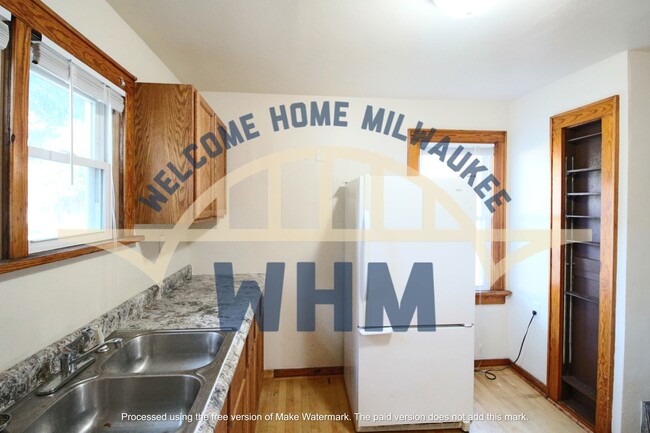 Building Photo - Spacious Corner Duplex Living Awaits!