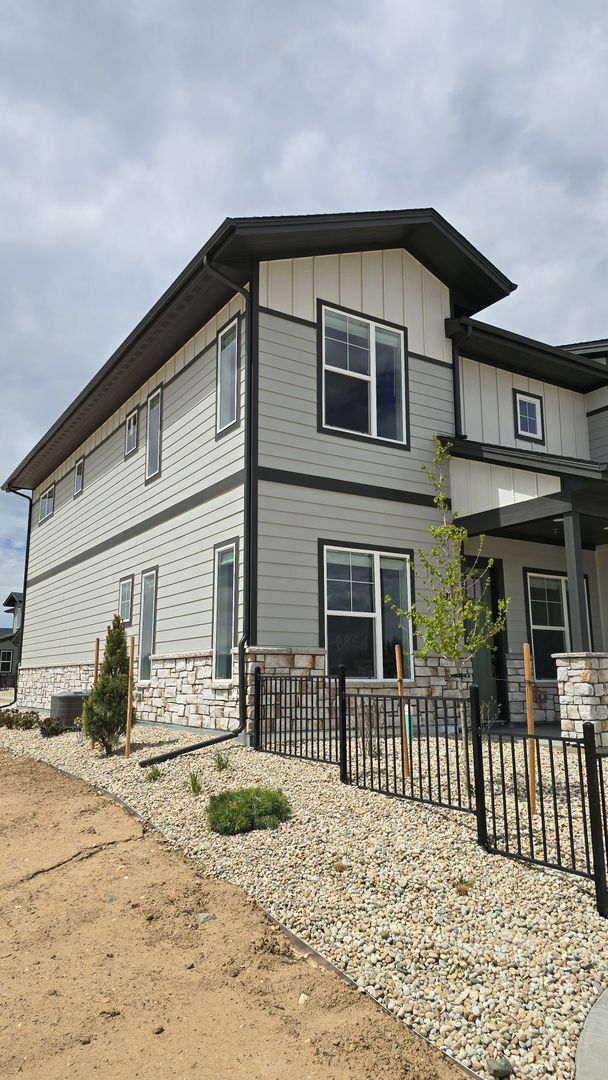 Building Photo - Brand New Timnath  End Unit Townhome Prope...