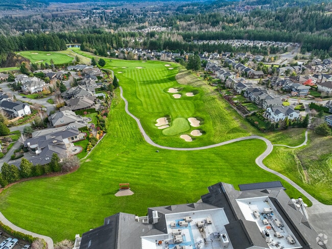 The Golf Club at Snoqualmie Ridge is flanked by homes.