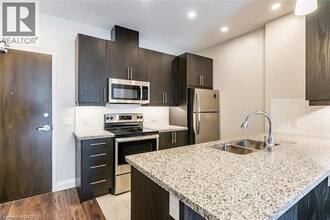 Building Photo - 118 King St E