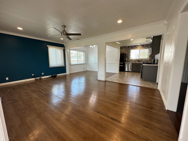 View to living room, kitchen and dining area - 2513 Dashwood St