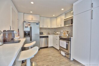 Building Photo - 5555 Collins Ave