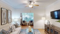 Located at 50 St Andrews Dr in Augusta, GA, this well-appointed one-bedroom, one-bathroom residence offers a comfortable and cohesive living experience across a single floor. The living area is a standout feature, characterized by elegant crown molding, a ceiling fan, and warm hardwood-style flooring. Large windows flood the space with natural light and provide pleasant outdoor views of surrounding greenery, while a dedicated sitting nook creates an inviting secondary lounge area within the room.

The kitchen is both functional and stylish, featuring white cabinetry, granite-style countertops, stainless steel appliances, and a breakfast bar that connects seamlessly to the adjacent dining area. The dining space is framed by wainscoting and a decorative pendant light, lending a refined, classic character to mealtimes.

The bedroom is a well-sized retreat, appointed with plush carpeting, a ceiling fan, and a window that overlooks lush landscaping, offering a peaceful atmosphere. A dedicated closet provides practical storage. The full bathroom includes a tub-shower combination, a vanity with granite-style countertops, hardwood-style flooring, and clean, neutral finishes throughout. Every room reflects a consistent design sensibility — bright, warm, and welcoming.