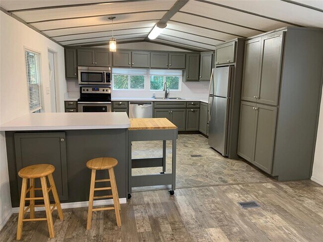 Building Photo - 6432 Longmire Rd