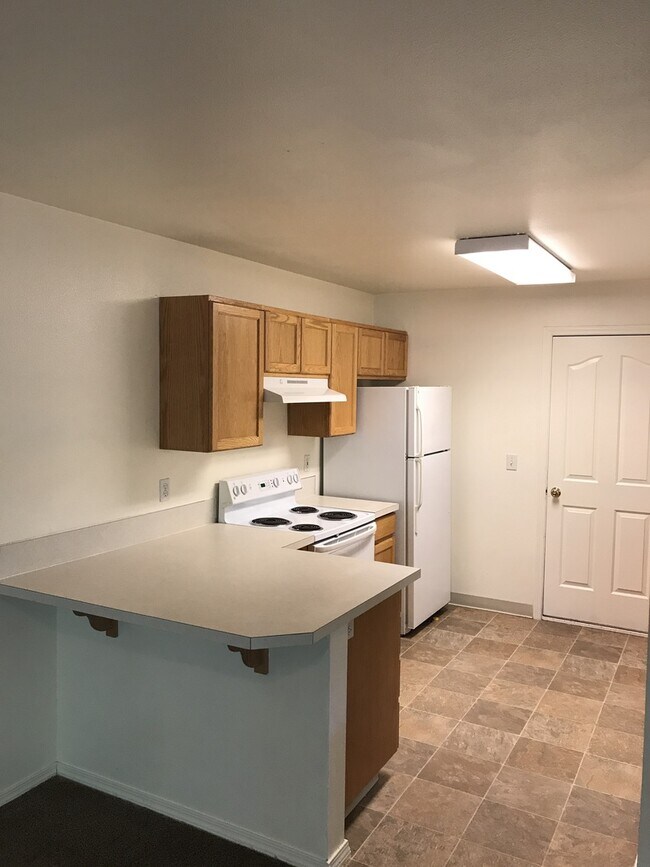 Building Photo - 2 bedrooms 1.5 bathroom with large living room, large kitchen PLUS 1 car garage. Bedrooms are huge