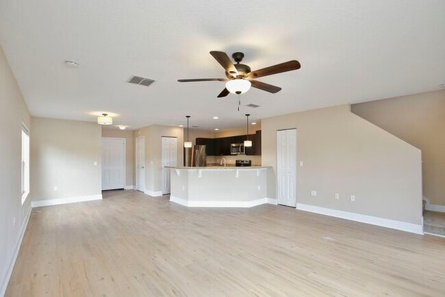 Building Photo - Spacious 3/2.5 End-Unit with Breathtaking Lake Views in Sanford!