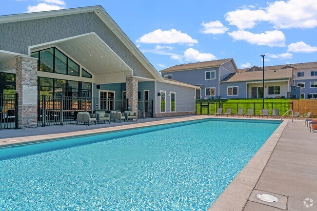 Relax by the pool at The Lodge Luxury Apartments in Rochester MN - The Lodge at Overland