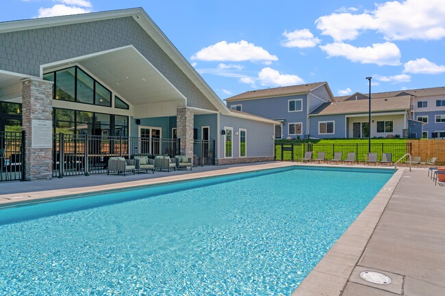 Relax by the pool at The Lodge Luxury Apartments in Rochester MN - The Lodge at Overland