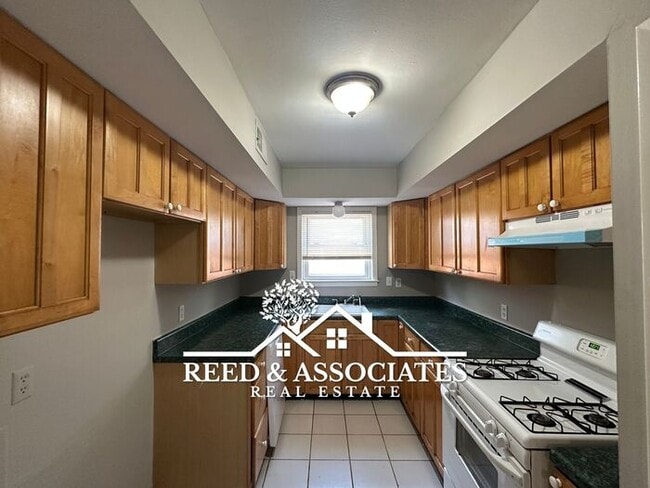 Building Photo - Spacious 4 Bedroom with Large Backyard!